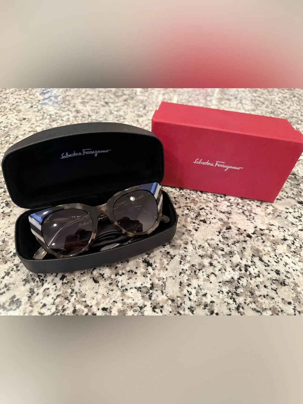 Salvatore Ferragamo Tortoiseshell Cat-Eye Sunglasses with Blue Accent.